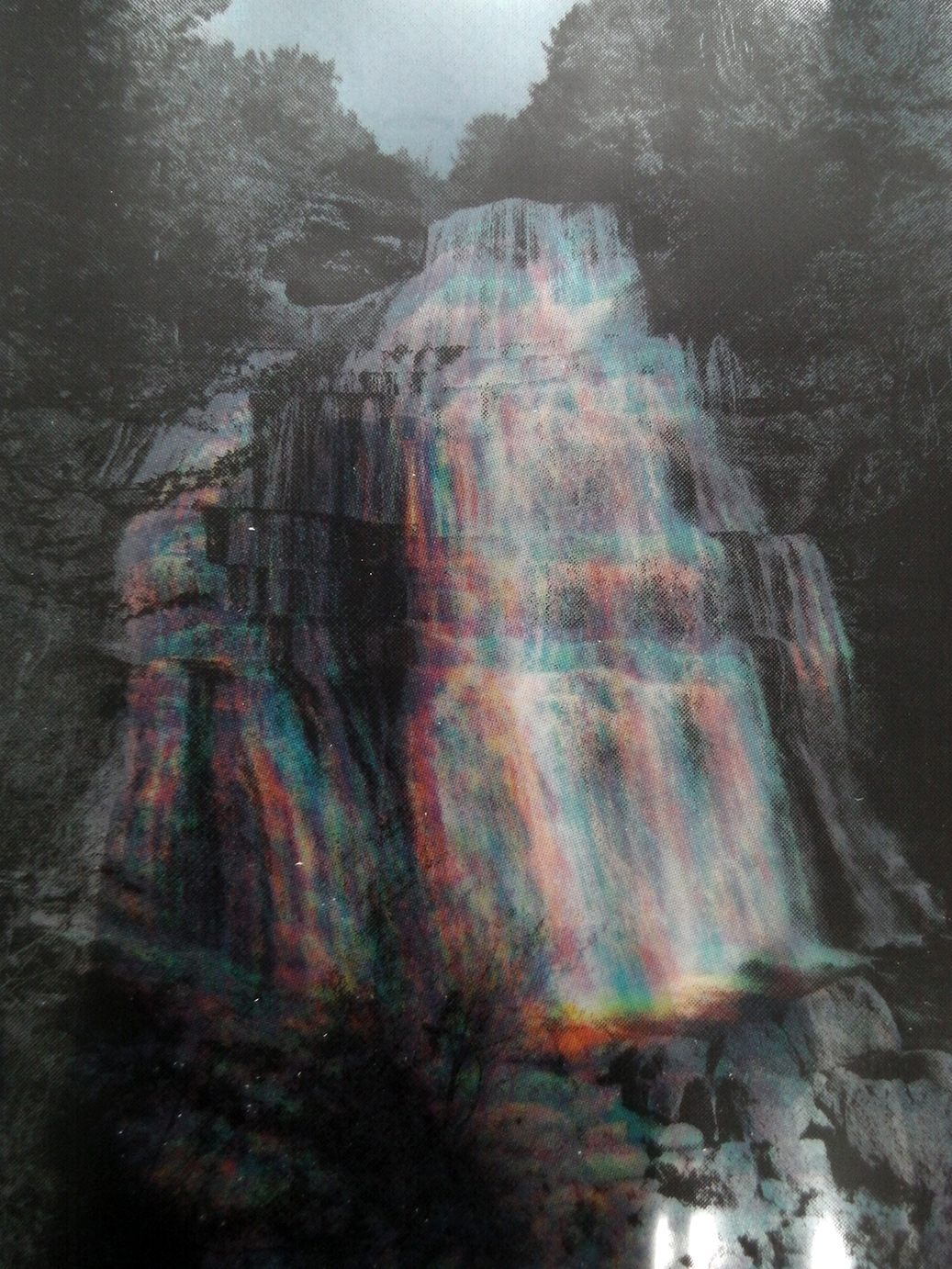  Superimposition of prints on transparent films to reproduce a four-color process