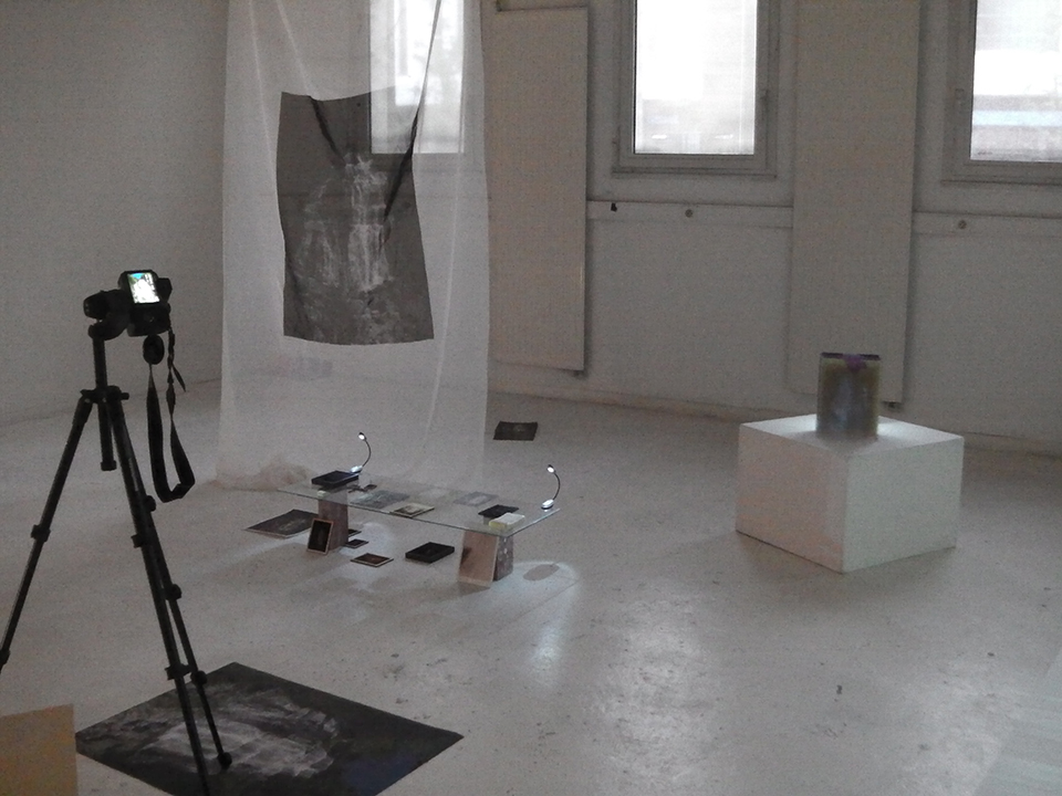 Camera stand, silkscreen on voile, miniatures and silkscreen on Plexiglas assembled with threaded rod