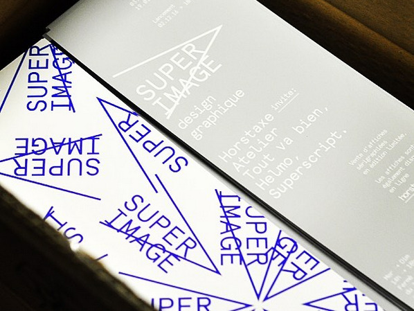 Photograph of the invitation cards for the Super Image #2 exhibition