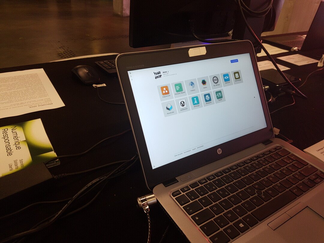 A close-up view of a laptop showing the YunoHost software interface