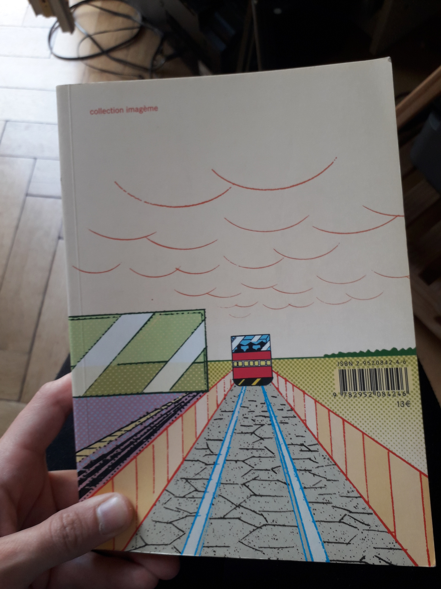 Image 13 : Verso de la couverture avec le départ d'un train vu de dos