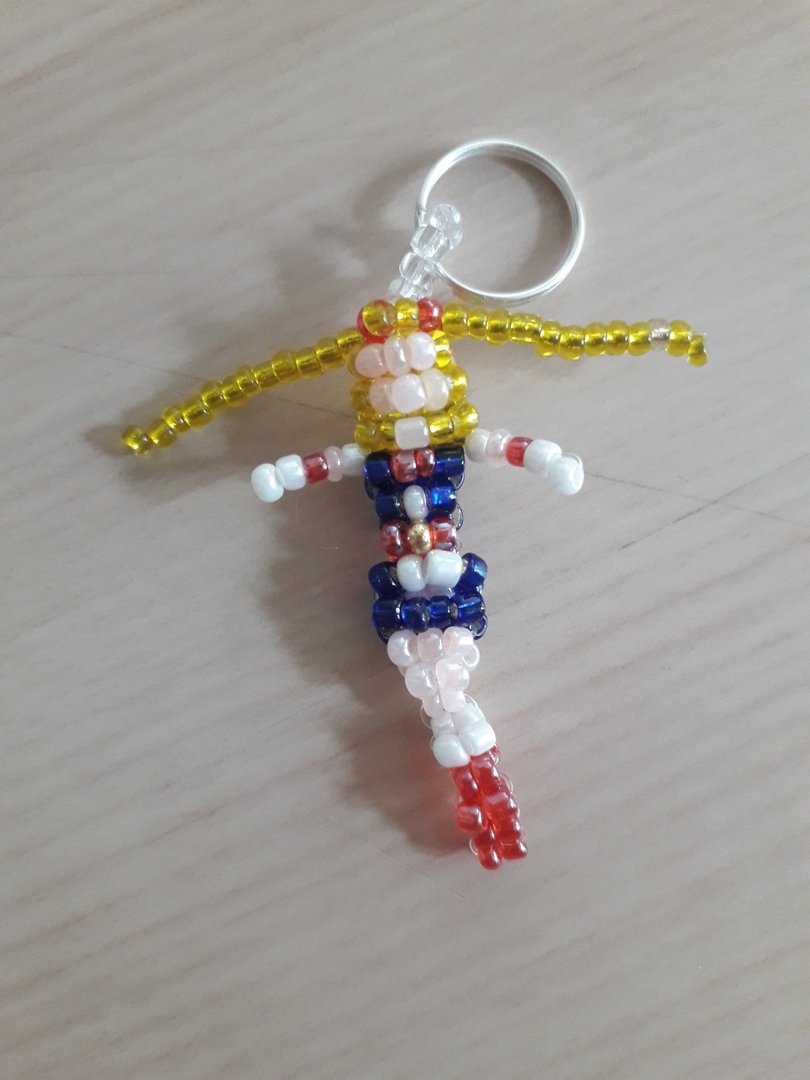 Photographie d'un porte-clés en perle à l'effigie de Sailor Moon