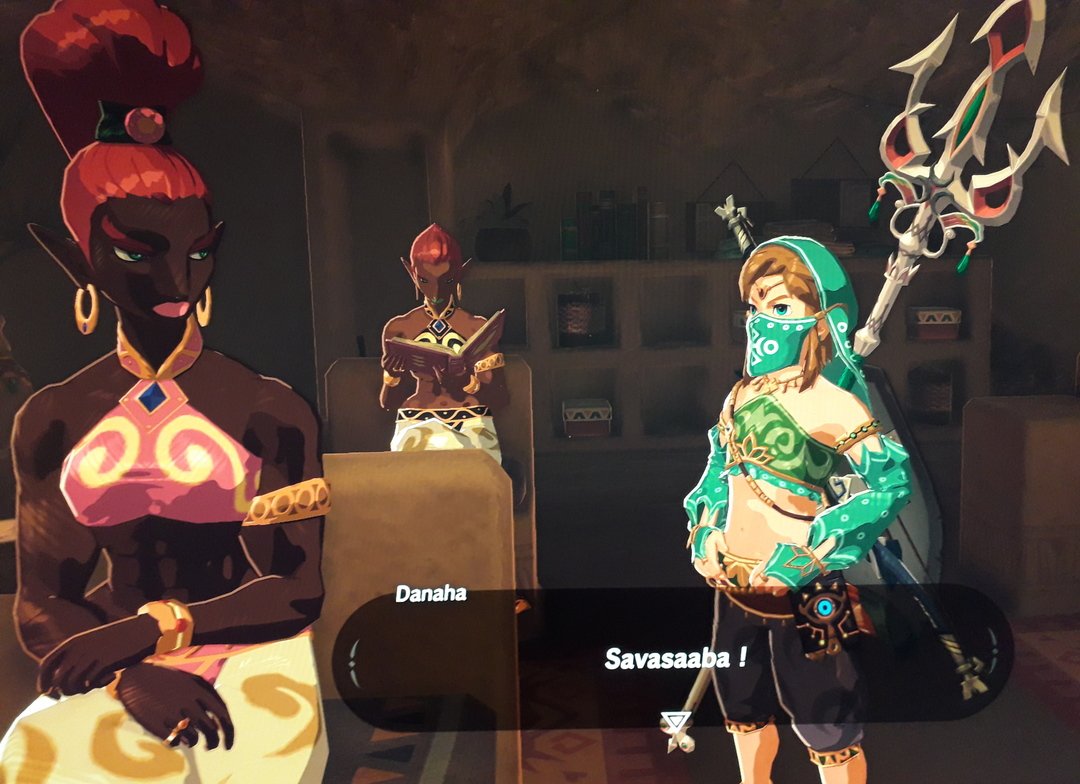 Trois personnages dans un jeu vidéo dont deux qui dialoguent ensemble